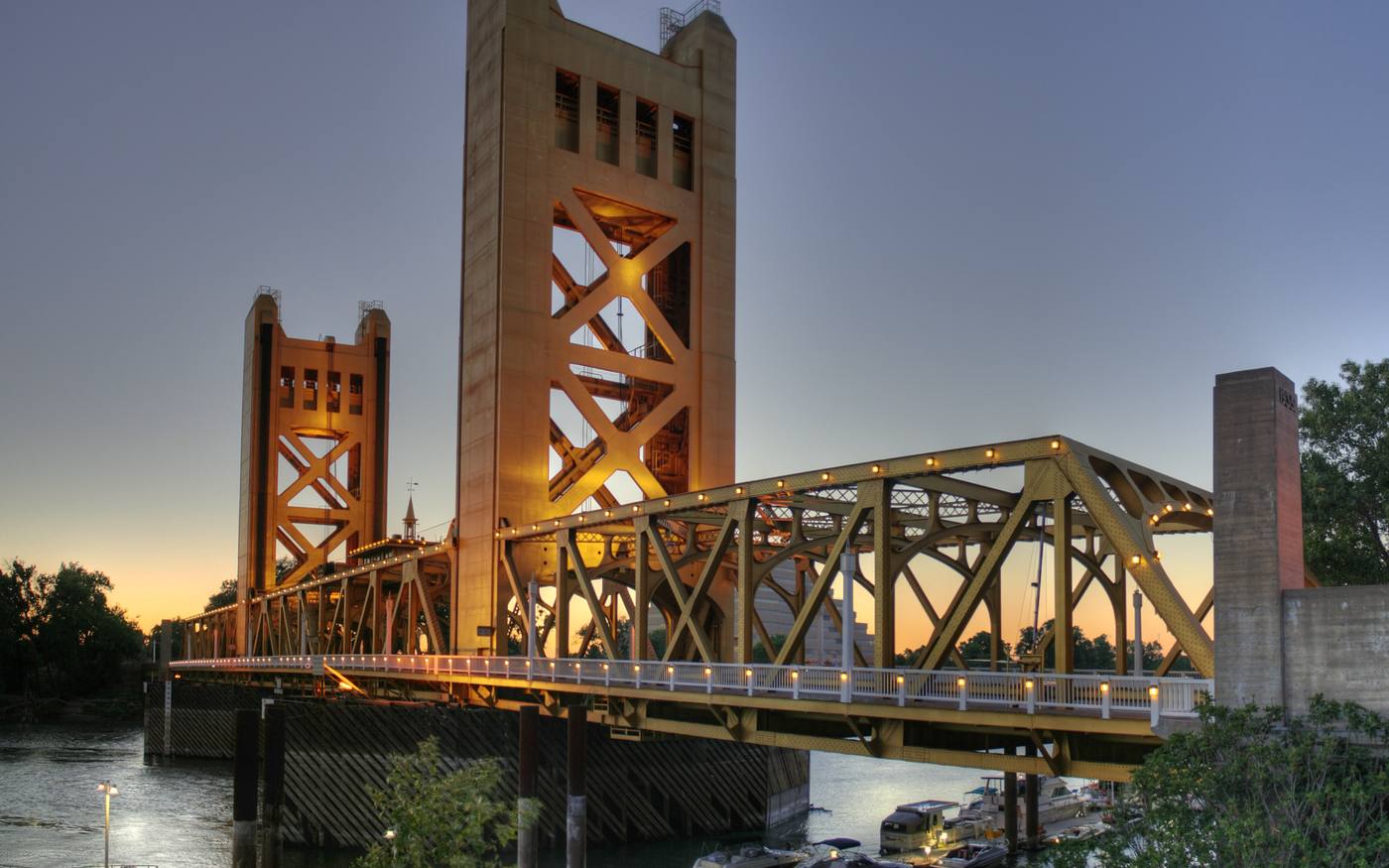 Tower Bridge over the Sacramento River at dusk, the heart of our Sacramento towing service area